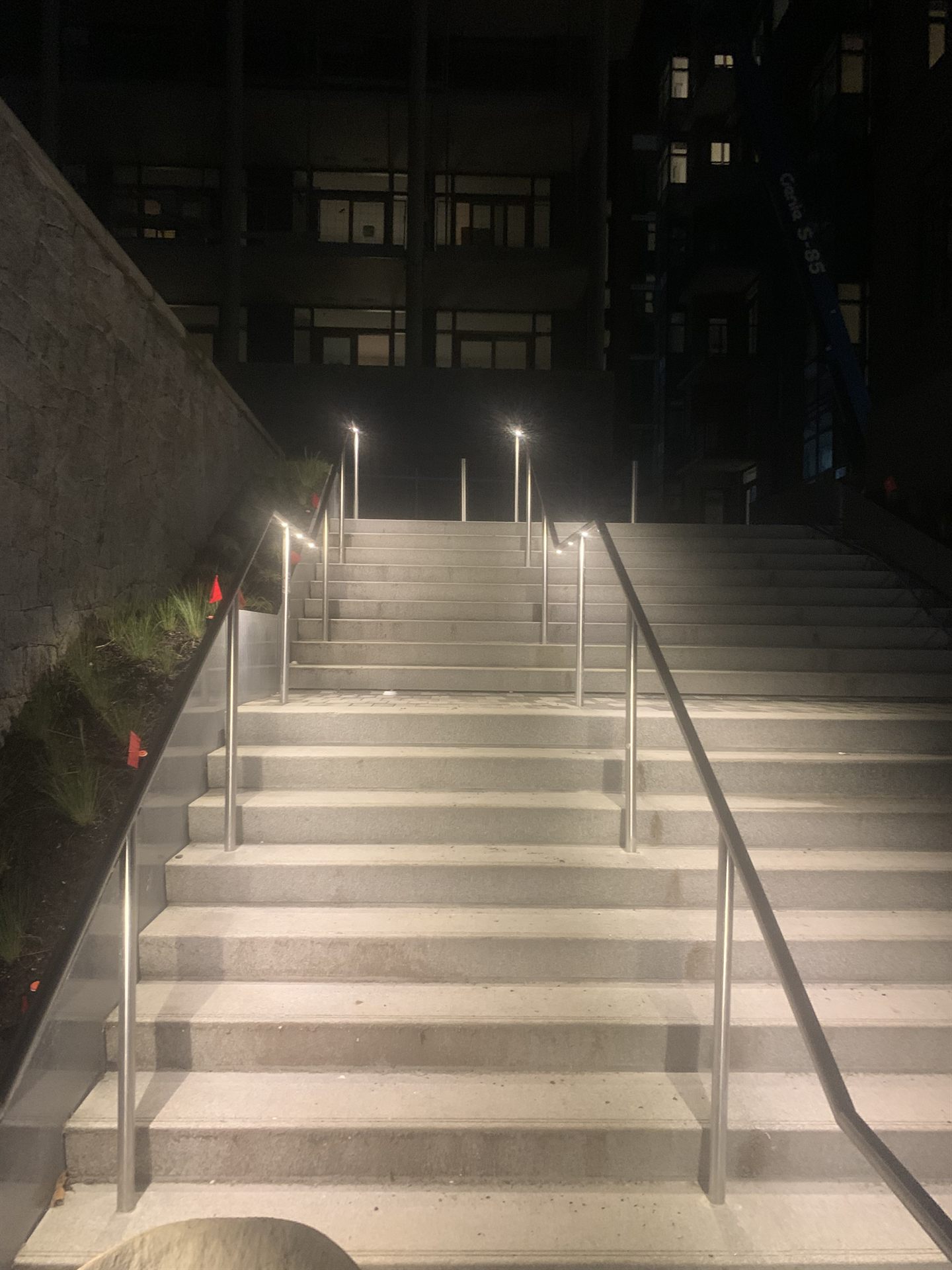Stainless steel handrails installed at night